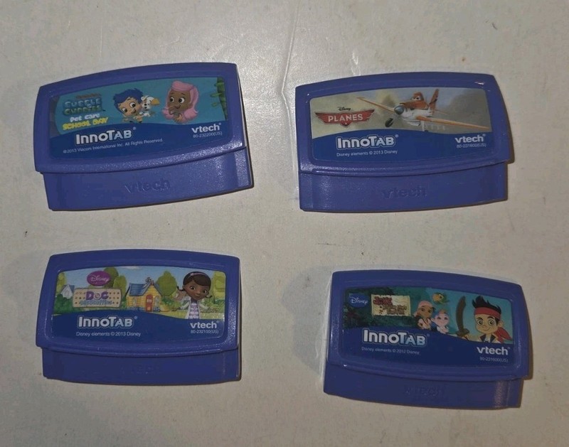 4 vintage Vtech disney games Planes,bubble Guppies,jake Never land,doc Mcstu