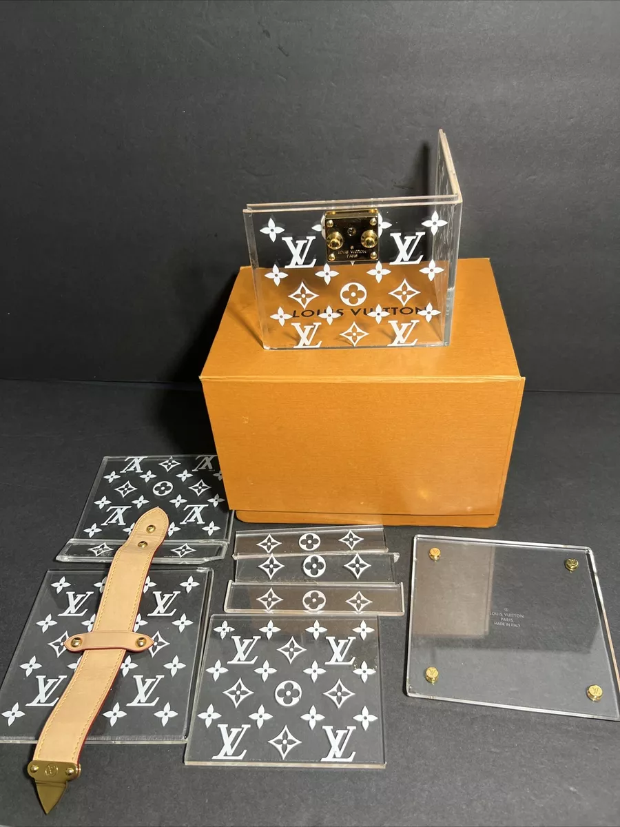 Authentic Louis Vuitton, metal cubes with certificate of authenticity and  box