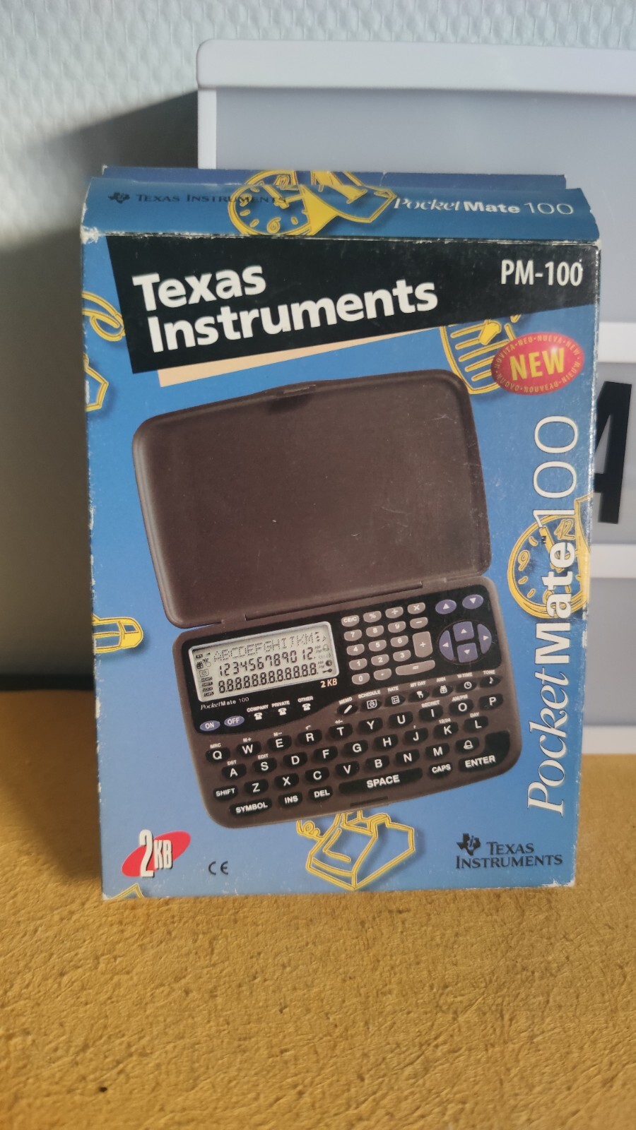 Organisateur personnel Texas Instrument PM-100 avec répertoire et calculatrice 10 chiffres