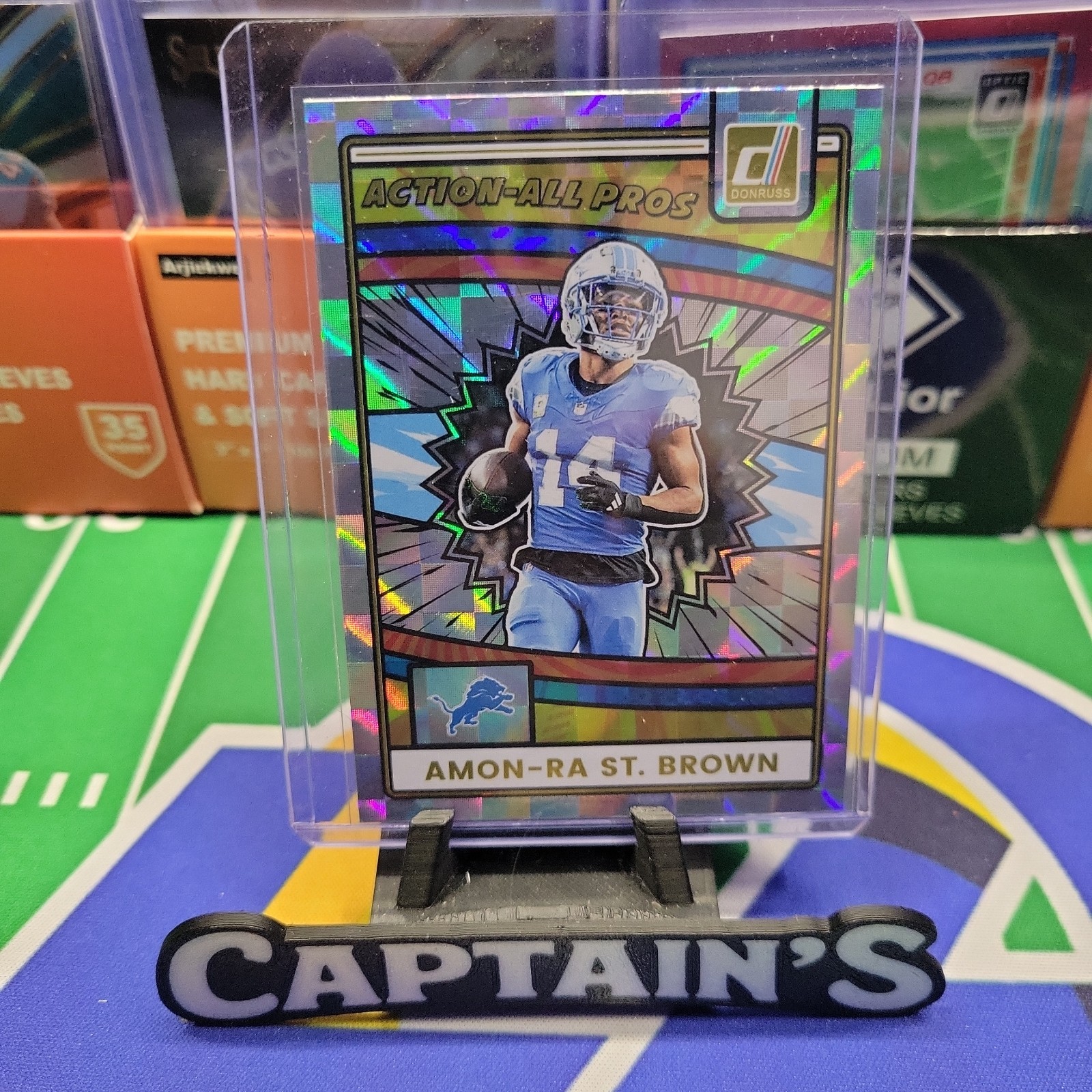 Amon-Ra St. Brown #AAP-AST Football Cards 2025 Panini Donruss Action All-Pros trading card — raw and PSA graded price guide