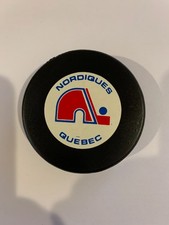 Vintage Quebec Nordiques Official Game Puck by Trench and signed by Ziegler