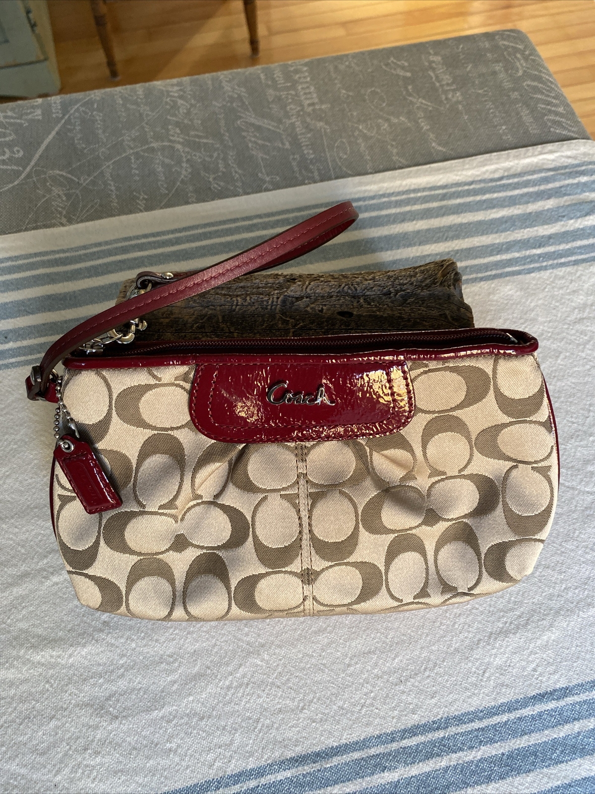 COACH SIGNATURE JACQUARD WRISTLET WITH MAROON LEATHER… Gem