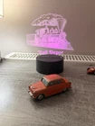 CORGI 201M 'AUSTIN CAMBRIDGE'. ORANGE. FRICTION DRIVE. VINTAGE. GOOD. RARE.