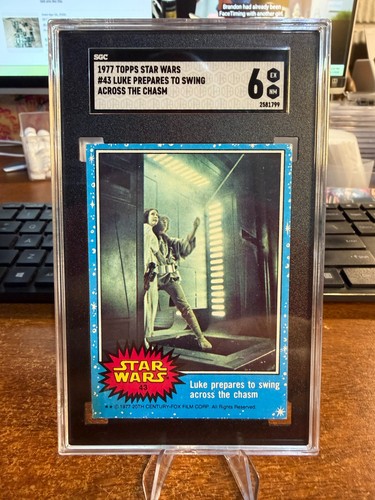 1977 Topps Star Wars #43 Luke prepares to swing across the chasm — SGC 6