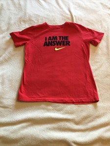 red black and yellow nike shirt
