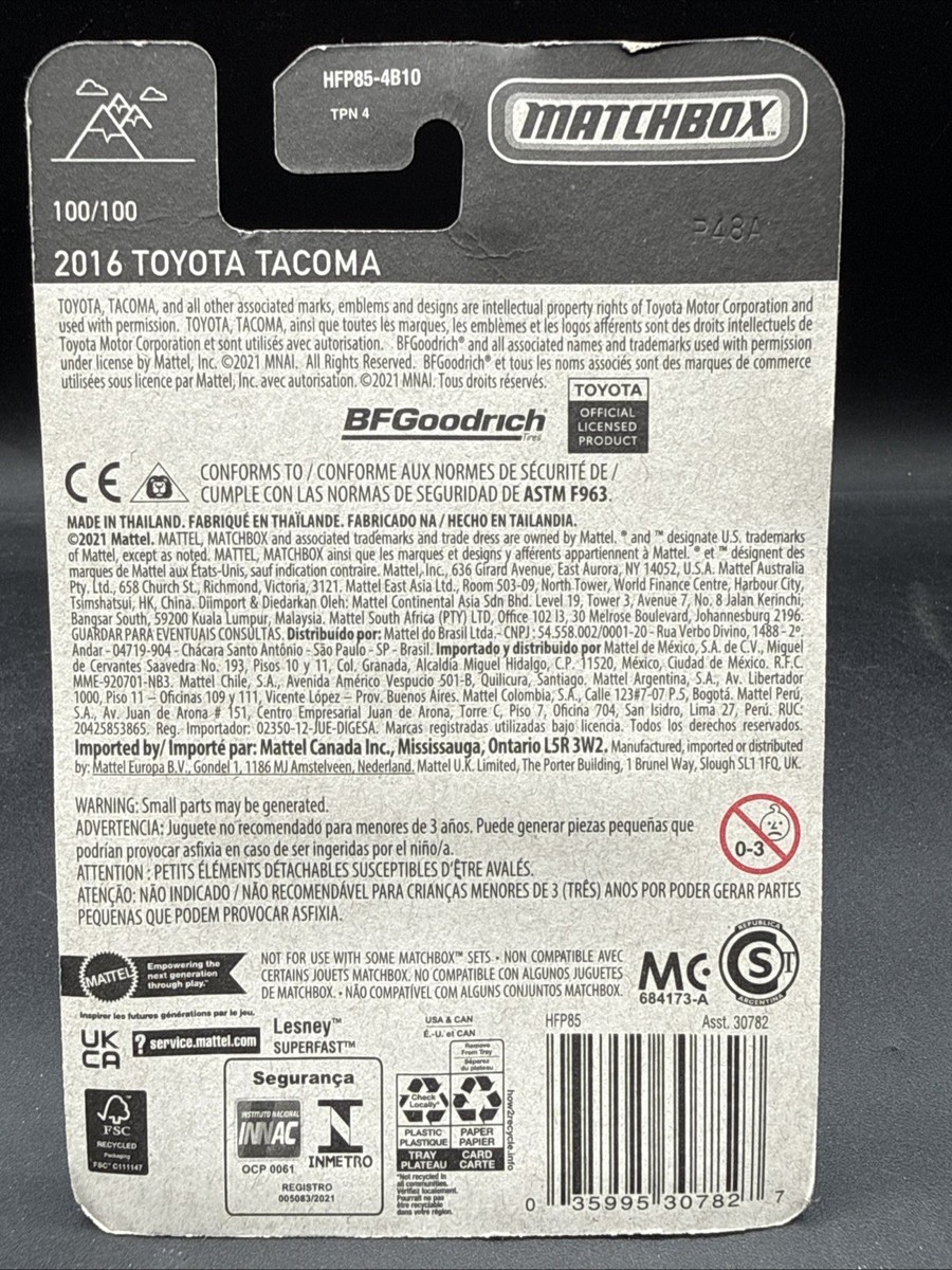 Matchbox Toyota Tacoma 2016 Con Camper – Serie MBX MOUNTAIN – Scala 1:64 – Bianco Metallizzato