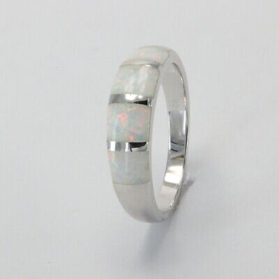 Details about   Blue or White Fire Opal 8 CZ Ring Sterling with /Rhodium Size 8 or Size 9