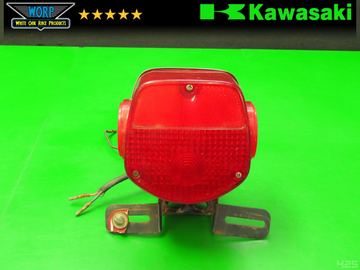 GENUINE OEM 1974-77 KAWASAKI KZ400 BRAKE TAIL LIGHT LAMP 23024-059