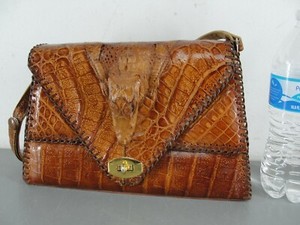 alligator head purse