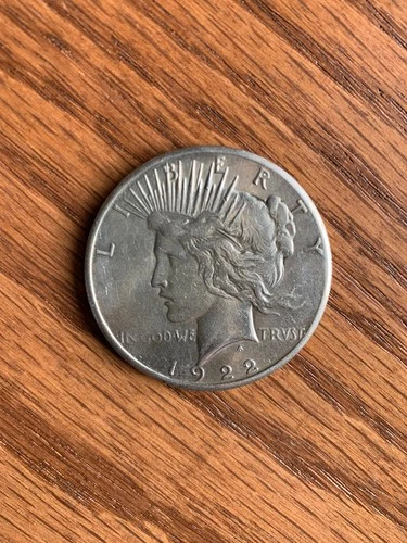 1922-P Peace Dollar AU (about uncirculated).  Contains roughly $72 of silver