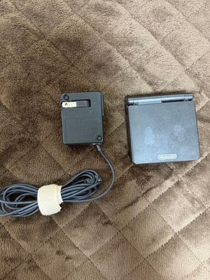 Game Boy Advance SP main unit with AC adapter and Mario vs. Donkey Kong