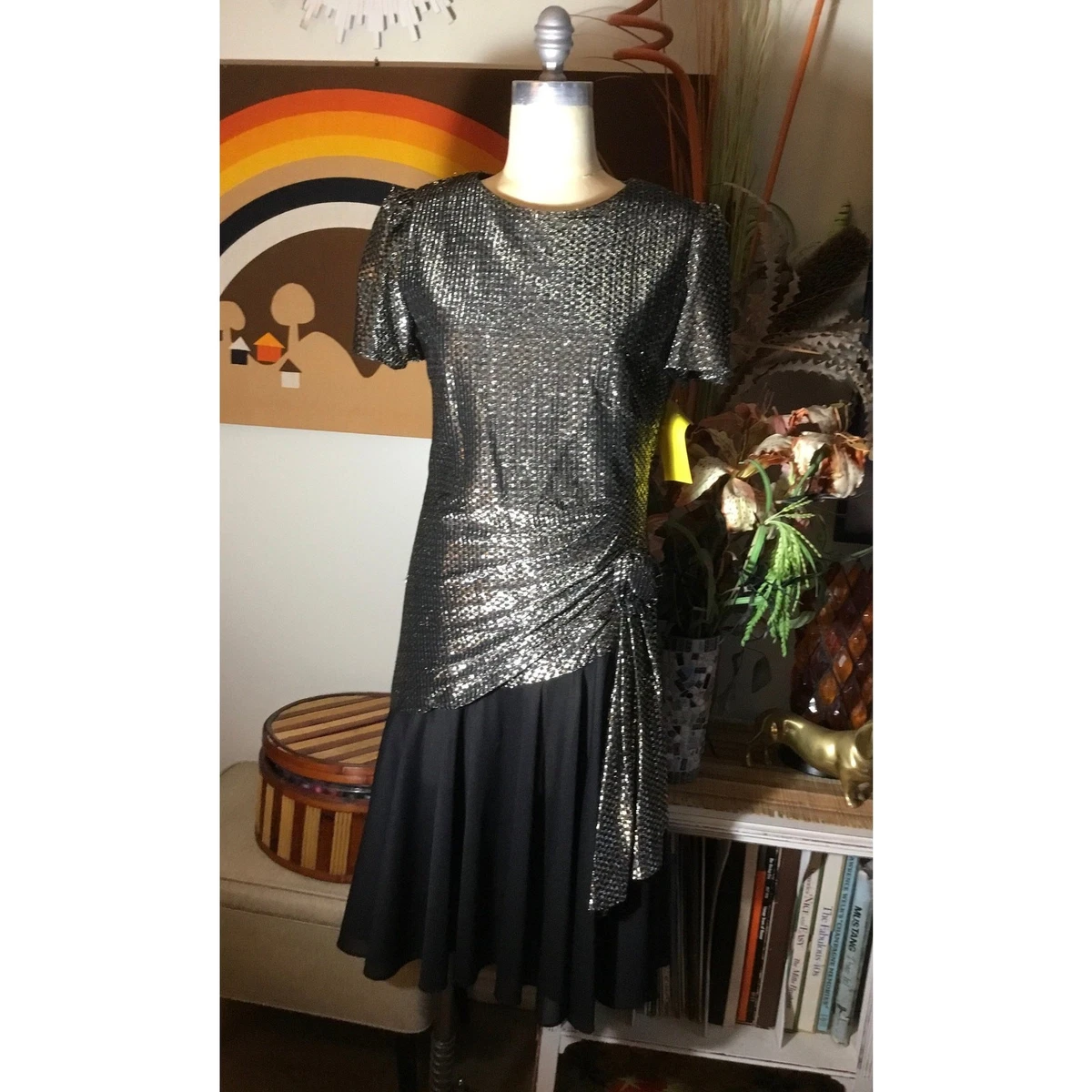 sachin and babi light blue dress In the late 1980s and early 1990s, evening fashion was all about drama,  sparkle, and statement silhouettes. Sequins, bold shoulders, sculpted  shapes, satin, ruffles, and extravagant details turned formal dresses into  pure