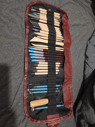 Set of 34 Tools for Sculpting Clay in Storage Roll: pre owned