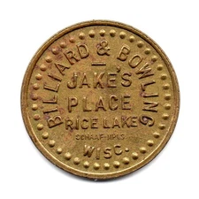JAKE’S PLACE • GOOD FOR 5¢ IN TRADE • RICE LAKE, WISCONSIN, WI. • TC-218785