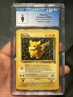 Pokemon TCG CGC 9 MINT Pikachu 1999 Black Star Promos 1 Pokémon League
