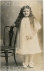 1910s RPPC Photo Postcard Plump Little Girl in White Lace & Bows Wavy Long Hair — photo 1