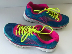 blue and yellow fila shoes