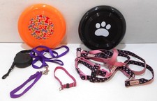 Lot of small dog leashes, collars, a retractable leash, 2 mini throwing discs