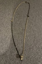 ALEXANDER MCQUEEN Gold and Gunmetal-Tone Skull Pendant And Charm Necklace