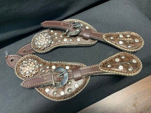 PAIR OF LEATHER COWBOY TOOLED WITH RHINETONES SPUR STRAPS