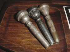 THREE VINTAGE TRUMPET MOUTHPIECE S  VINCENT BACH 7C BLESSING 7C  ONE EARLY