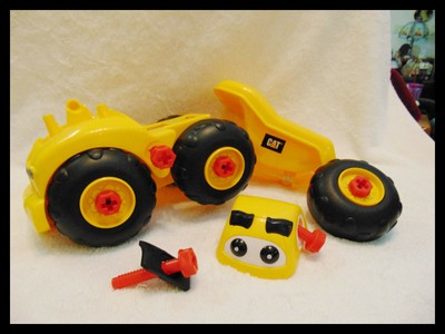 cat take apart dump truck