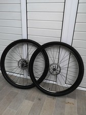 Two Matching Black Rimmed 700c Carrera Hybrid Wheels, With Discs And Tyres.