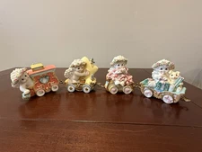 Dreamsicles rainbow express figures. Four train figures