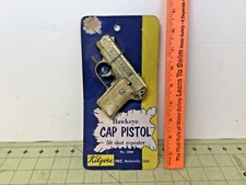 Vintage Hawkeye Cap Pistol 50 shot repeater by Kilgore new on the card RARE