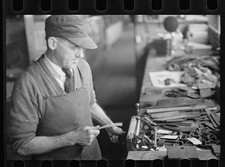 Photo:1935-1942 Man Working on Typewriter Repair Shop Tools FSA Photo thumbnail