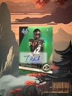 TRAVIS HUNTER 2023 BOWMAN UNIVERSITY GREEN REFRACTOR AUTO RC /99 Heisman 1st