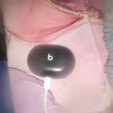 Beats by Dr headphones and charging case