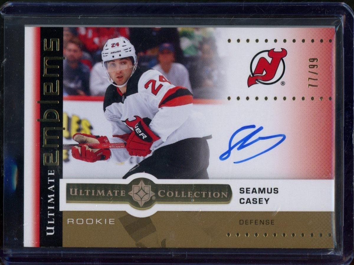 2024-25 UD Ultimate Collection Seamus Casey Emblems Auto Rookie Gold /99 #UER-CA