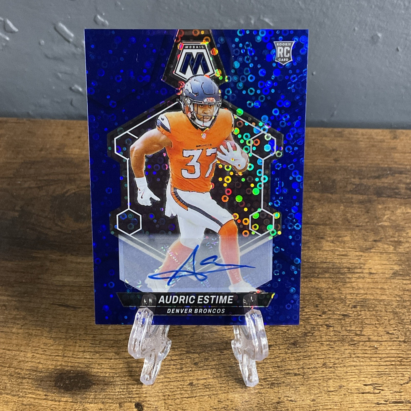 2024 Mosaic Audric Estime Blue Disco Prism No Huddle Auto Rookie Card.