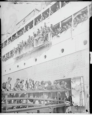 Spic Span in neat uniforms gals crowd bunks aboard ship Unit is un- Old Photo