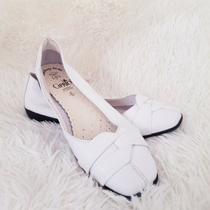 white leather pumps uk