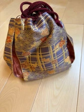 Drawstring type Japanese bag with purple and gold plaid pattern