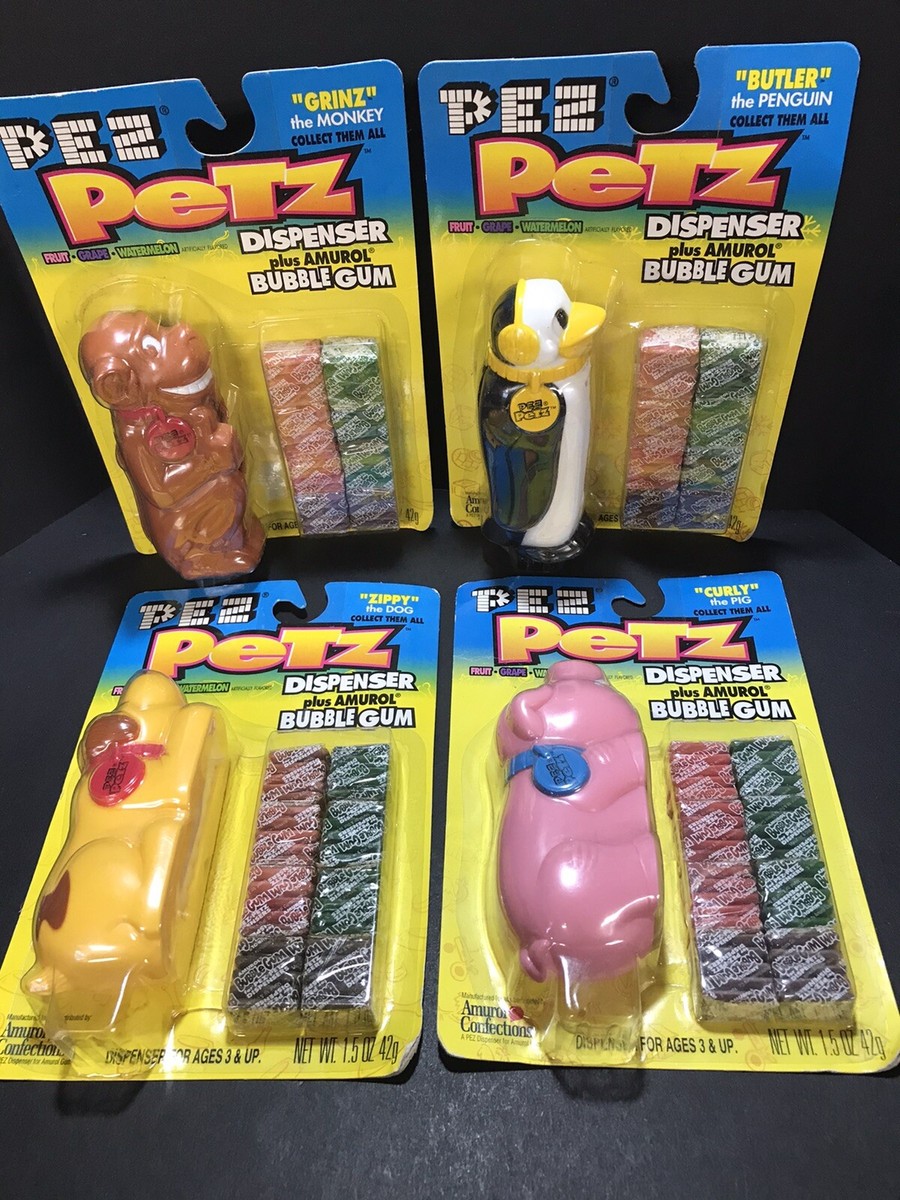 Vintage PEZ Petz Set (4) Grinz,Butler,Curly, Zippy Candy Vintage PEZ Petz Set (4) Grinz,Butler,Curly, Zippy Candy