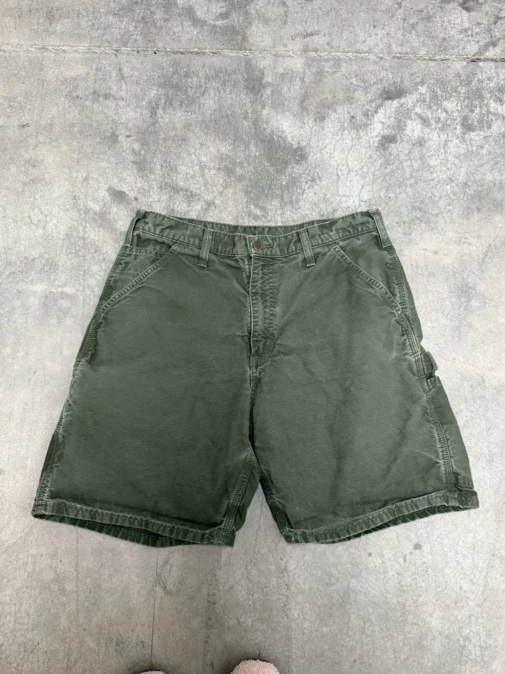Pantalones Cortos Carhartt Para Hombres 32 Verde Ejército Lona Trabajo Carpintero Sueltos Verde Oliva Desteñido Foto 2 de 4