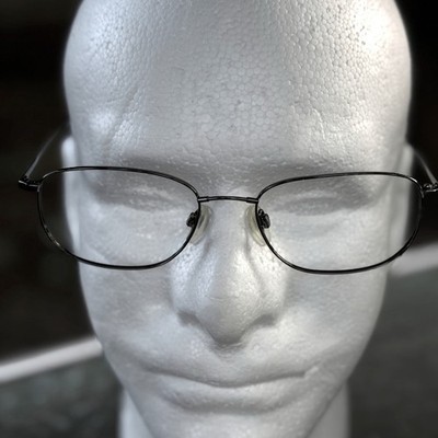 Flexon 600 by Marchon Gunmetal Oval Eyeglass Frames 54-18-145 with Theo Case