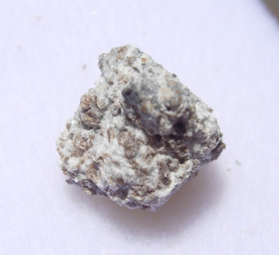 .441 grams Wadsworth Ohio Meteorite 9mm fragment in 1.5'' wide glass top case