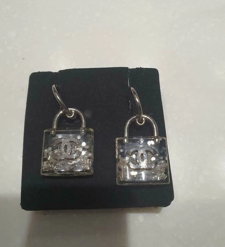 Chanel padlock earrings deals