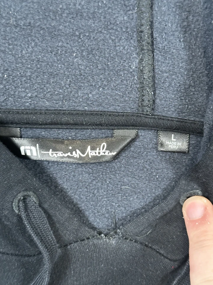 Sudadera con Capucha Travis Mathew Golf Hombre Mediana Negra Bolsillos Logo Golfista Grande Foto 3 de 4