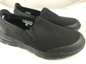 skechers negros hombre