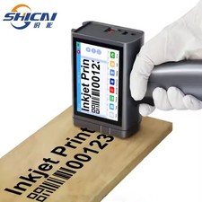 Chipless handheld inkjet printer prints on cardboard packaging bags and bottles