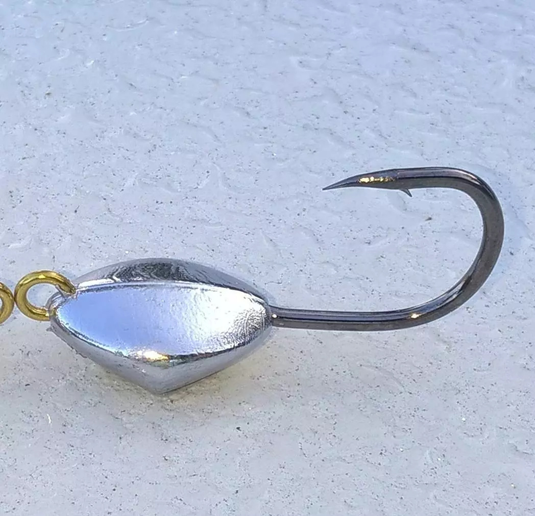 Bottom sweeper jig outlet