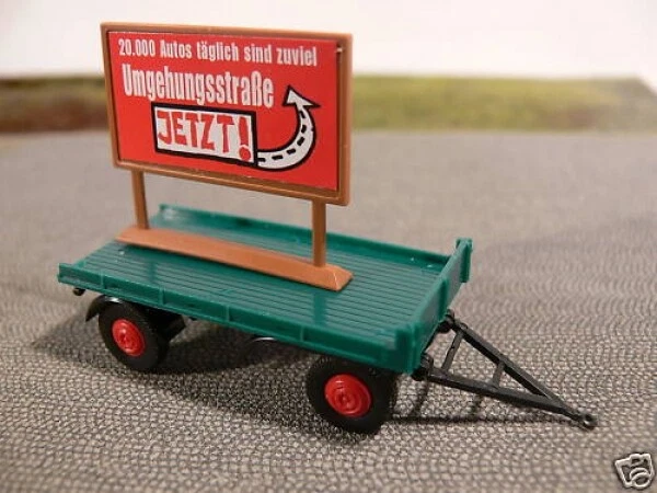 1/87 Brekina 2-Achs Anhänger mit Werbetafel 55235 - Bild 1 von 1