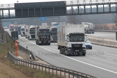 LKW Foto MAN Kofferauflieger Deutschland grau #m1zw