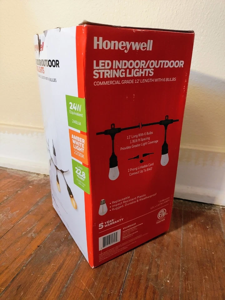 Cadena de luces LED enchufables para exteriores Honeywell 12' 6 bombillas Edison blanco cálido Foto 2 de 2