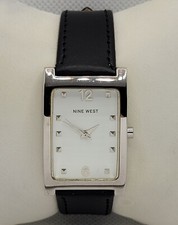 Ladies Nine West Classic Elegant Tank Silver Tone Black Leather Strap Watch J9